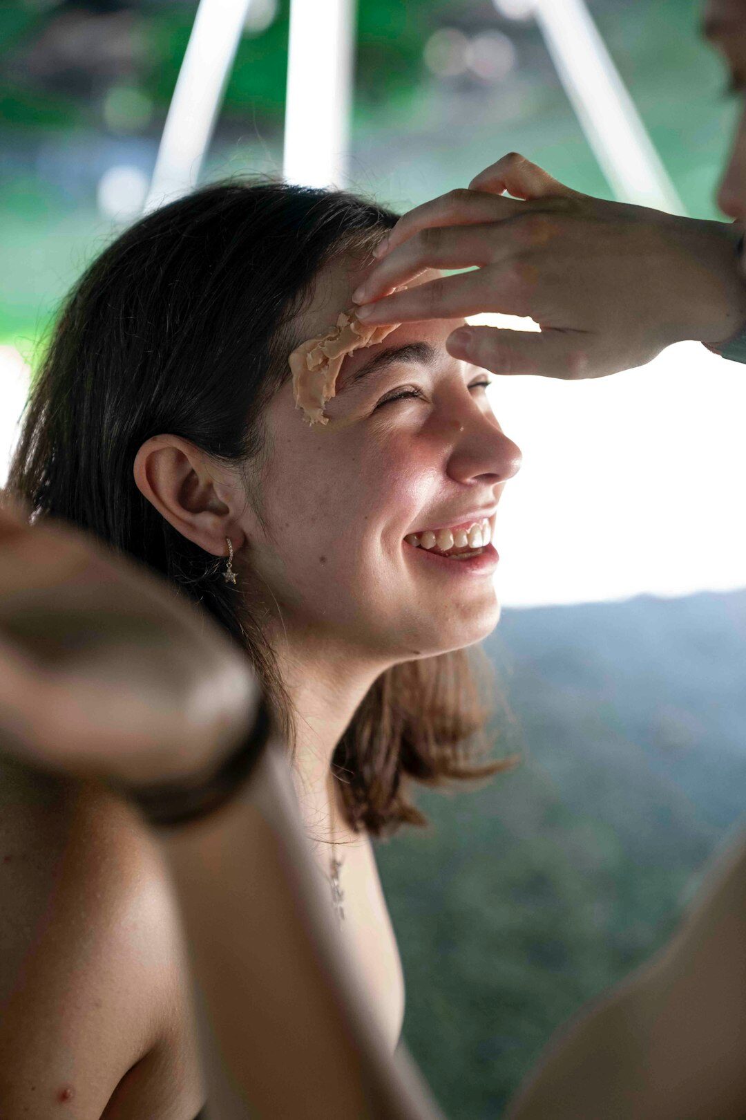 woman doing facial massage