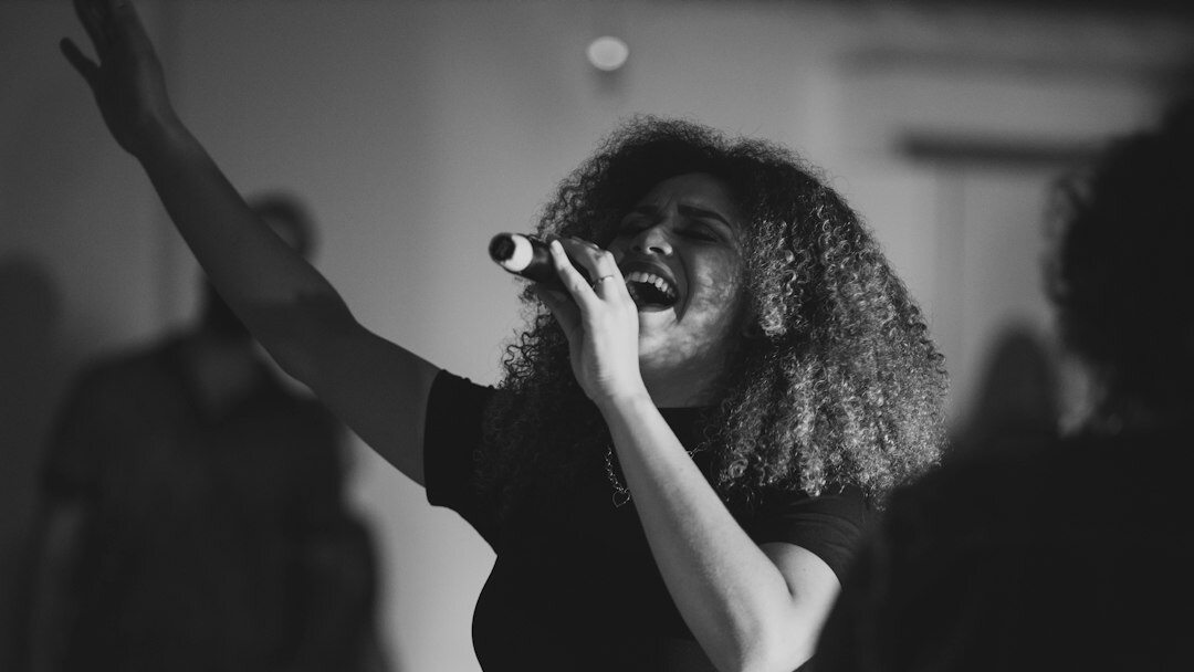 woman singing in studio